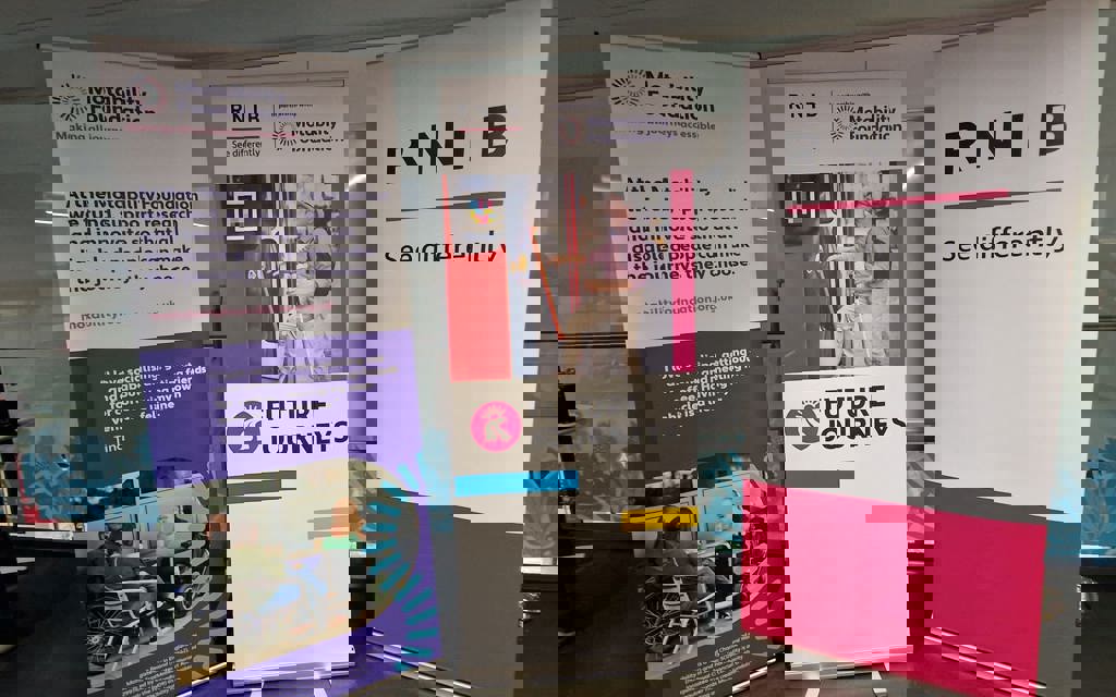 Three RNIB and the Motability Foundation partnership pull-up banners.