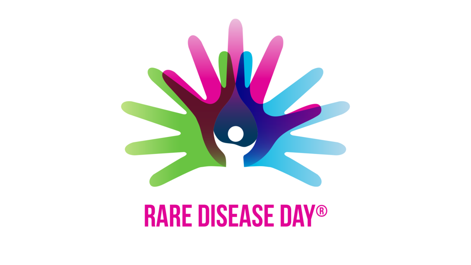 The logo reads: "Rare Disease Day". Their logo has three hands which overlap each other in green, pink and blue. In the centre is a white cartoon person. 